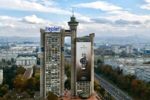 E-Scooter Communist Yugoslavia Tour - Stop 1: Western City Gate and Genex Tower (20 minutes, free)